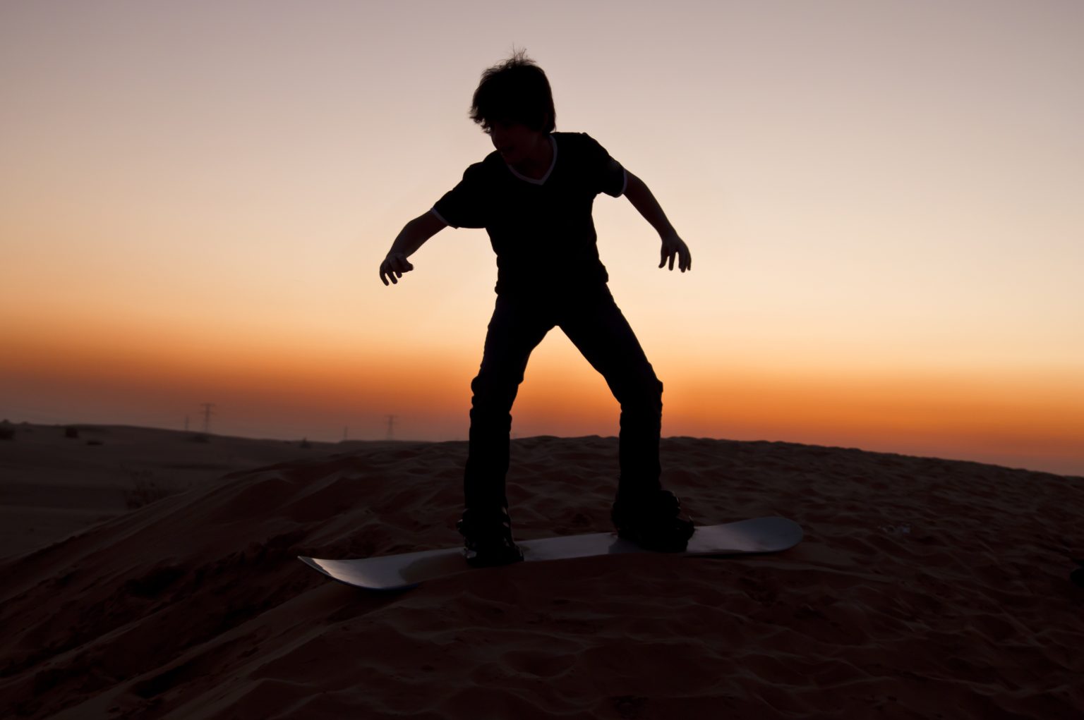 Sandboarding in the Gobi Desert