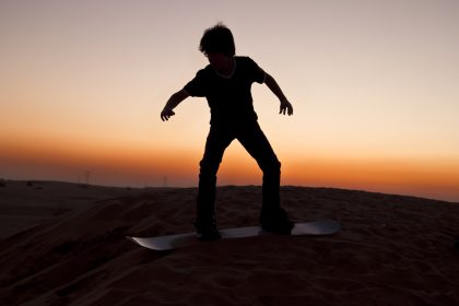 Sandboarding in the Gobi Desert